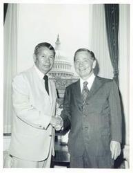 ["Black and white photograph print of Carl Albert posing with Fred Bradley from San Francisco. May 7, 1972"]