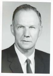 ["Black and white photograph print of Howard Akers, agricultural attach to Kenya. August 10, 1965"]