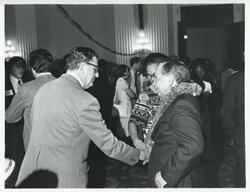 ["Black and white photograph print of Carl Albert with unidentified people at his birthday party, 1976"]
