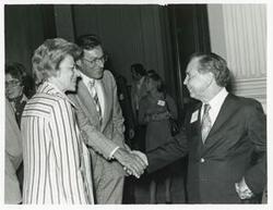 ["Black and white photograph print of Carl Albert with various unidentified people at his birthday party, 1976"]