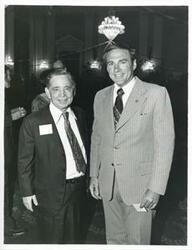 ["Black and white photograph print of Carl Albert with unidentified people at his birthday party, 1976"]