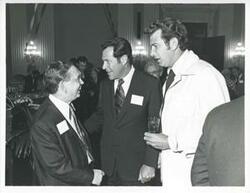 ["Black and white photograph print of Carl Albert with unidentified people at his birthday party, 1976"]