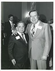 ["Black and white photograph print of Carl Albert with unidentified people at his birthday party, 1976"]