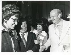 ["Black and white photograph print of Carl Albert speaking with Robert L.F. Sikes and others at his birthday party, 1976"]