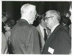 ["Black and white photograph print of John W. McCormack and Tom Steed shaking hands with one another, 1976"]