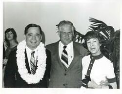 ["Black and white photograph print of Carl Albert and Mary Albert posing with an unidentified man. May 10, 1974"]