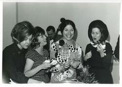 ["Black and white photograph print of Helen Newman Tuttle, Jane England Lawton, Carole Howard at Carl Albert's birthday party. May 10, 1974"]