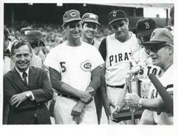 ["Black and white photograph print of Carl Albert standing with several baseball players."]