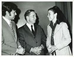 ["Black and white photograph print of Carl Albert with unidentified people."]