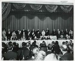 ["Black and white photograph print of several people at the National Prayer Breakfast. February 2, 1971"]
