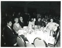 ["Black and white photograph print of Carl Albert, David Hall, Tom Steed, and an unidentified woman."]