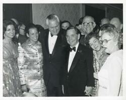 ["Black and white photograph print of David Hall, Carl Albert and Mary Albert, and others."]