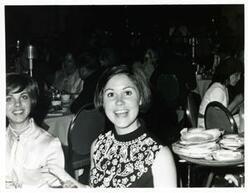 ["Black and white photograph print of an unidentified woman at a fund raising dinner sponsored by the Democratic National Committee. May 1971"]