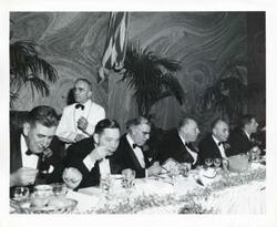 ["Black and white photograph print of Carl Albert with unidentified men."]