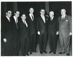 ["Black and white photograph print of Ed Edmondson, Carl Albert, Victor Wickersham, Lawrence F. O'Brien, Sam Rayburn, and two unidentified men."]