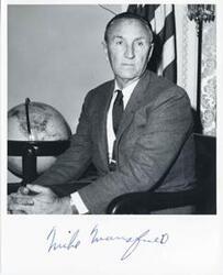 ["Black and white photograph print of a close-up of Mike Mansfield."]