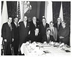 ["Black and white photograph print of Carl Albert with Ed Edmondson, Hale Boggs, Victor Wickersham, and others at a luncheon honoring Project Hope Director, Dr. William Walsh, and Dr. Cabieses Molina. April 1, 1963"]