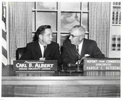 ["Black and white photograph print of Carl Albert with Harold C. Ostertag on Congressman Ostertag's television show. February 1, (between 1961 and 1965--when Albert was Majority Leader and Ostertag was still in Congress)"]