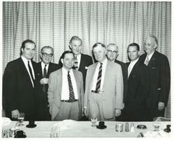 ["Black and white photograph print of Ed Edmondson, Toby Morris, Carl Albert, A. S. Mike Monroney, Michael J. Kirwan, Tom Steed, John Jarman, and Robert S. Kerr."]