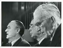["Black and white photograph print of a close-up of Mike Mansfield, Carl Albert and John W. McCormack."]