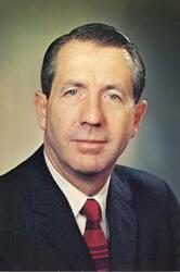 ["Color photograph print studio portrait of unidentified man."]