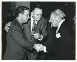 ["Black and white photograph print of Carl Albert posing with B. F. Sisk and Reyser Jefferson."]