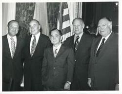 ["Black and white photograph print of Carl Albert, Gerald R. Ford and three other men."]