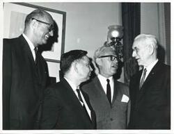 ["Black and white photograph print of Carl Albert, Arthur Goldberg, John W. McCormack, and ? Roosevelt."]
