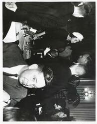 ["Black and white photograph print of Lady Bird Johnson, Carl Albert and others at a luncheon on January 9, 1965"]
