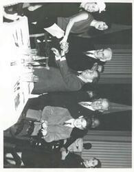 ["Black and white photograph print of Wright Patman, Lady Bird Johnson, Lynda Bird Johnson, Carl Albert, and several other people at an unidentified function. 3043 includes John McCormack."]