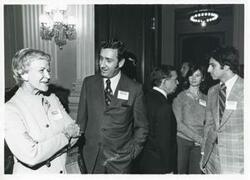 ["Black and white photograph print of Carl Albert and several others at a reception for freshman members of the 94th Congress. December 1, 1975"]