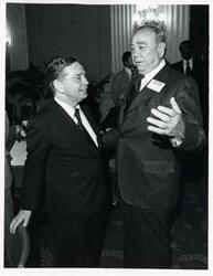 ["Black and white photograph print of Carl Albert with unidentified people at the reception for freshman members of the 94th Congress. December 1, 1975"]