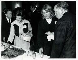["Black and white photograph print of Carl Albert with unidentified people at the reception for freshman members of the 94th Congress. December 1, 1975"]