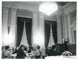 ["Black and white photograph print of Carl Albert and others at a reception for freshman members of the 94th Congress. December 1, 1975"]