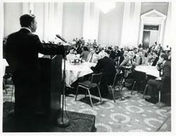 ["Black and white photograph print of Carl Albert and others at a reception for freshman members of the 94th Congress. December 1, 1975"]
