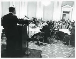 ["Black and white photograph print of Carl Albert and others at a reception for freshman members of the 94th Congress. December 1, 1975"]