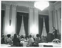 ["Black and white photograph print of Carl Albert and others at a reception for freshman members of the 94th Congress. December 1, 1975"]