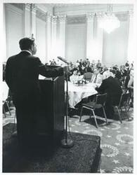 ["Black and white photograph print of Carl Albert and others at a reception for freshman members of the 94th Congress. December 1, 1975"]