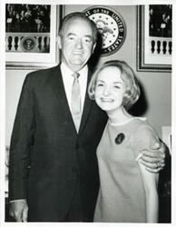 ["Black and white photograph print of Hubert H. Humphrey posing with Polly Ritter."]
