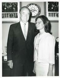 ["Black and white photograph print of Hubert H. Humphrey posing with an unidentified woman."]