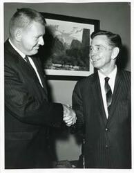 ["Black and white photograph print of Carl Albert with an unidentified man."]