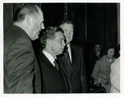 ["Black and white photograph print of Carl Albert with unidentified men."]