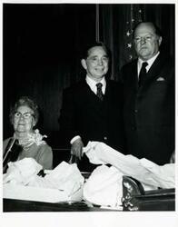 ["Black and white photograph print of Lottie Ross sitting next to Carl Albert"]