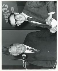 ["Black and white photograph print of Hale Boggs shaking hands with Nick Begich. October 15, 1972"]