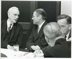 ["Black and white photograph print of John W. McCormack, Robert S. McNamara, Carl Albert, and others at a luncheon in the Joe Martin Room. March 30, 1967"]