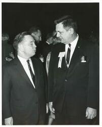 ["Black and white photograph print of Carl Albert with unidentified men."]