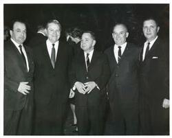 ["Black and white photograph print of Carl Albert with unidentified men."]