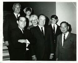 ["Black and white photograph print of Fred Harris, Hubert H. Humphrey, Carl Albert, and four others."]