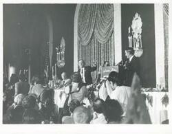 ["Black and white photograph print of Hubert H. Humphrey, Carl Albert, and several other people at the 1976 Democratic National Convention."]