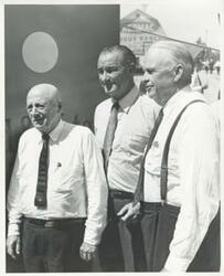 ["Black and white photograph print of Lyndon B. Johnson, Sam Rayburn, and Robert S. Kerr at a party commemorating the publication of Kerr's book, Land, Wood and Water. August 1960"]